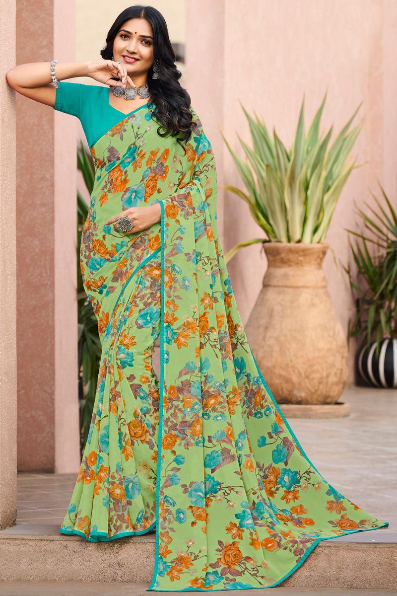 Stunning Casual Look Floral Printed Georgette Saree In Green Color