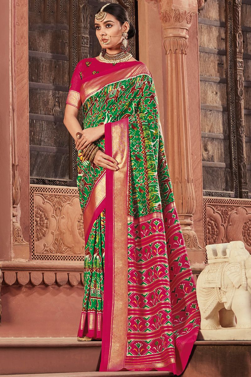 Engaging Green Color Art Silk Fabric Foil Printed Saree