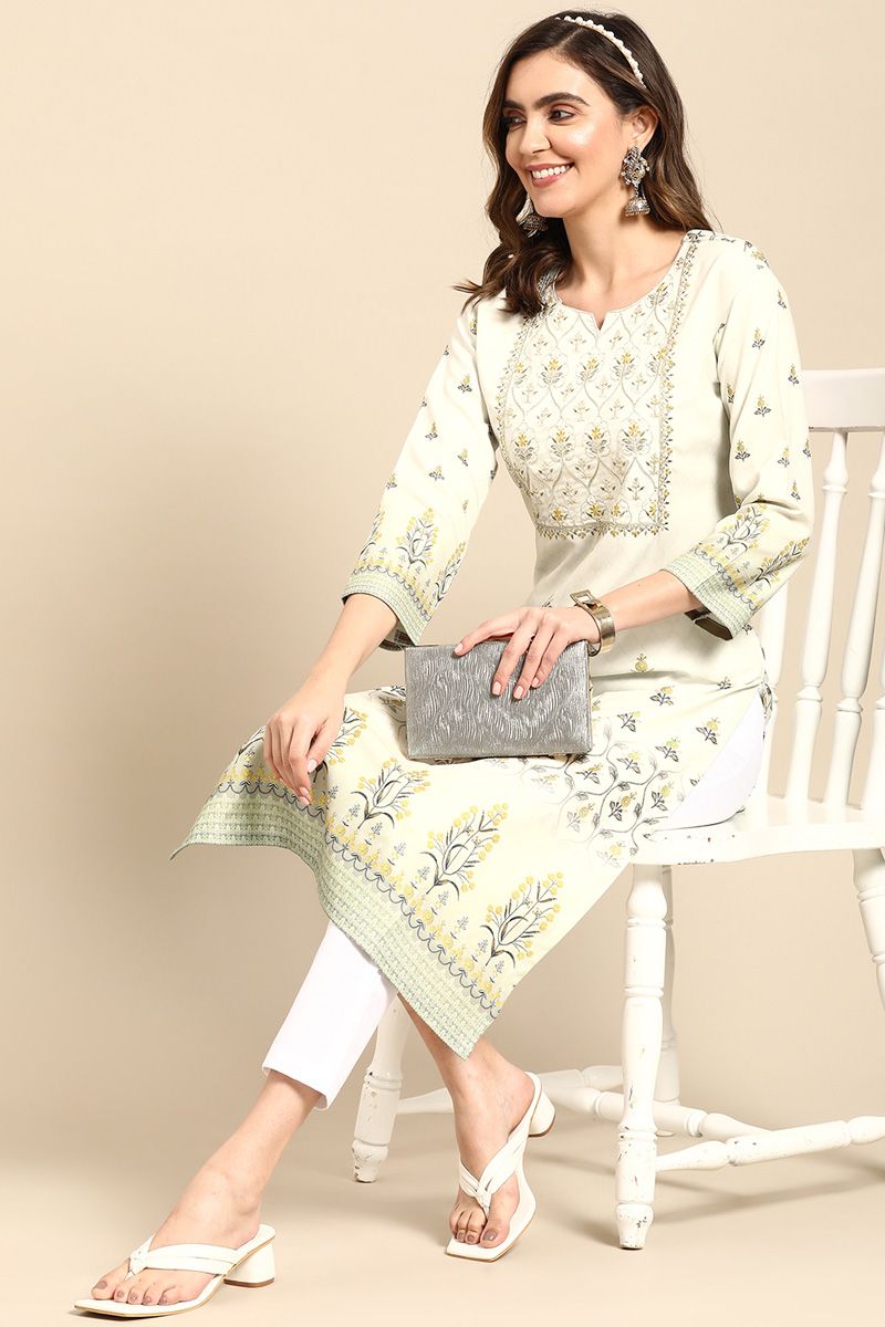 Engaging Sea Green Color Rayon Fabric Floral Printed Kurti