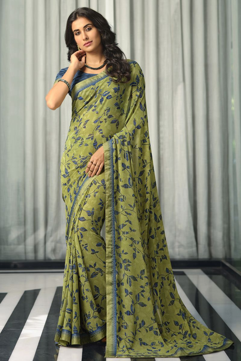 Beguiling Printed Designs On Sea Green Color Organza Fabric Saree