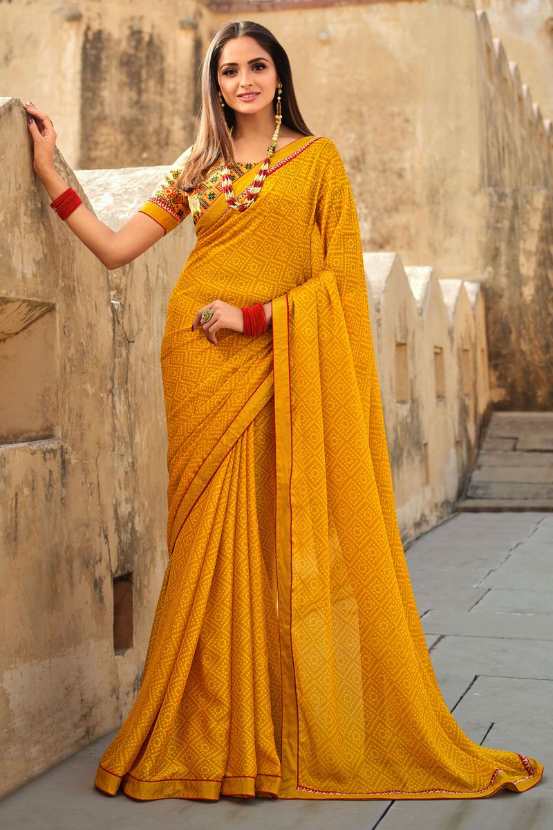 Georgette Fabric Yellow Color Coveted Saree