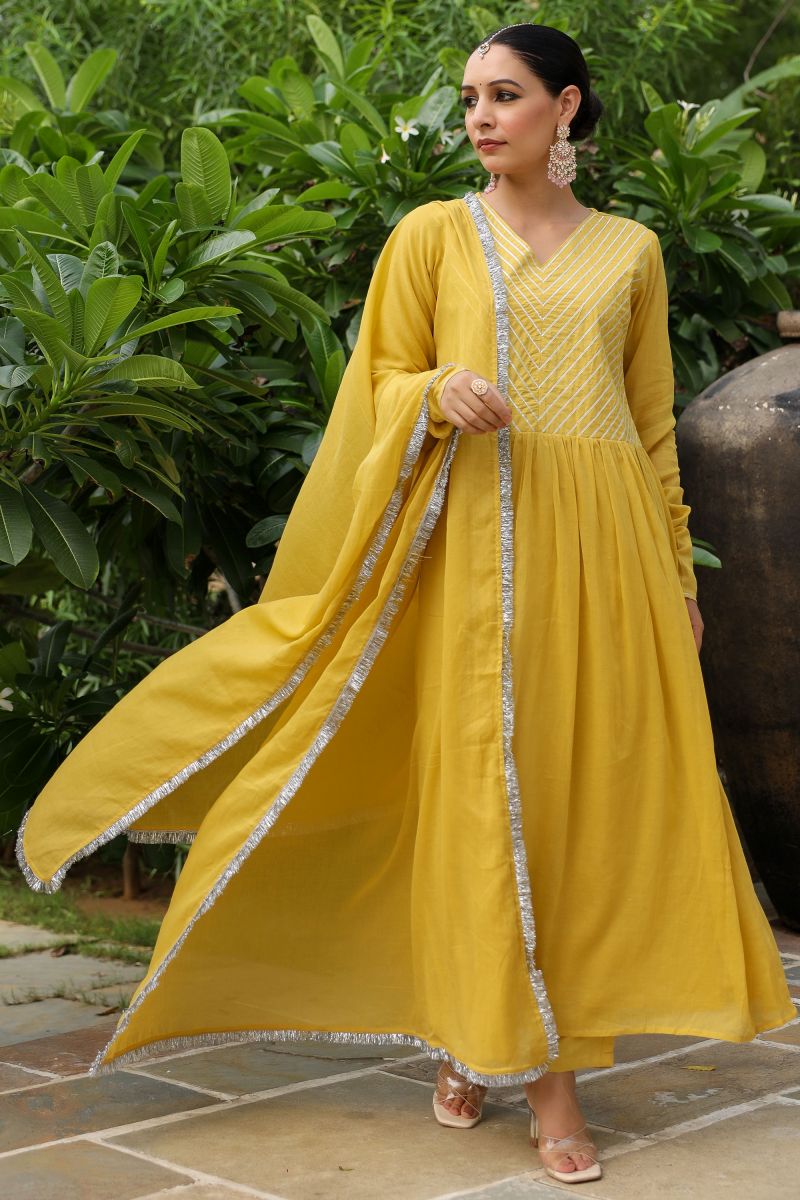 Yellow Color Engaging Fancy Fabric Readymade Suit