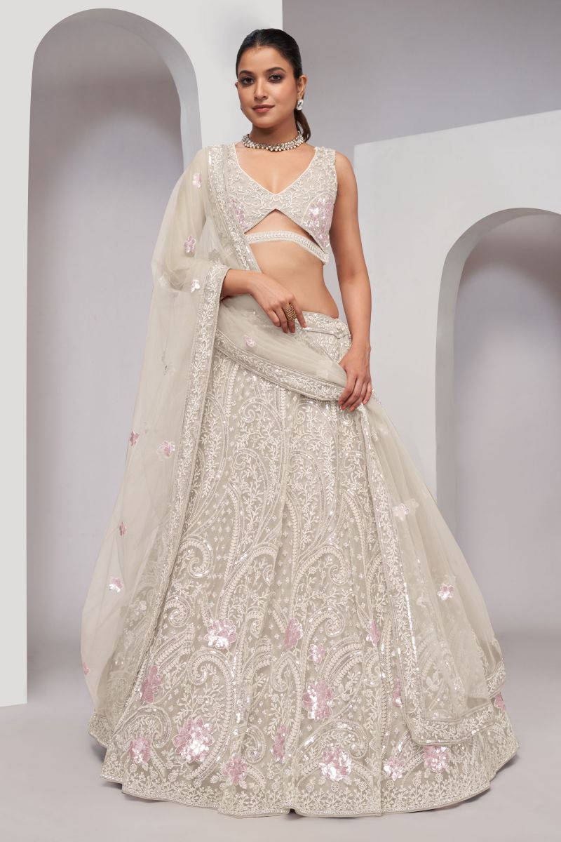 Net Fabric Off White Color Riveting Lehenga With Sequins Work