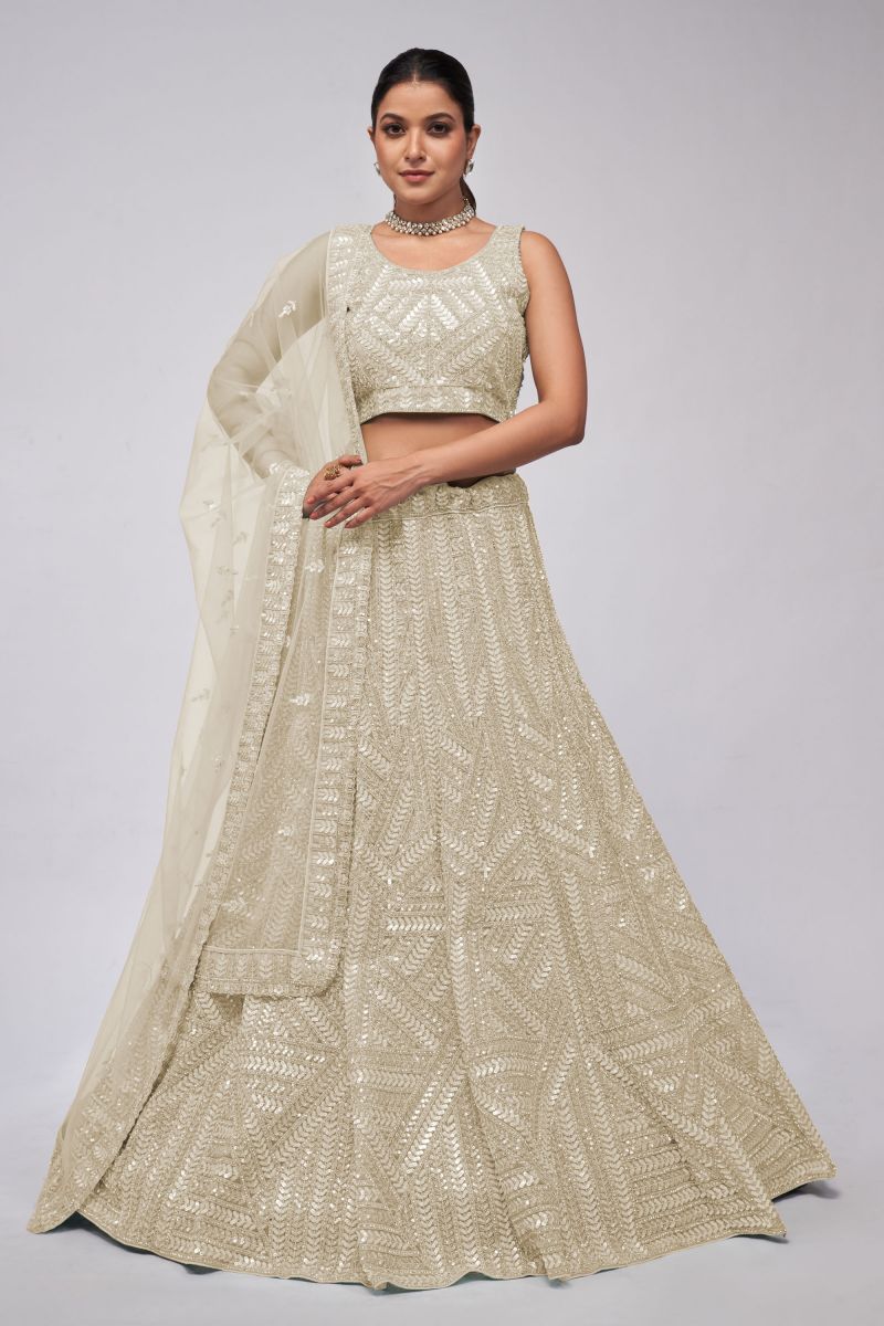 Sequins Work On Beige Color Sober Lehenga In Net Fabric