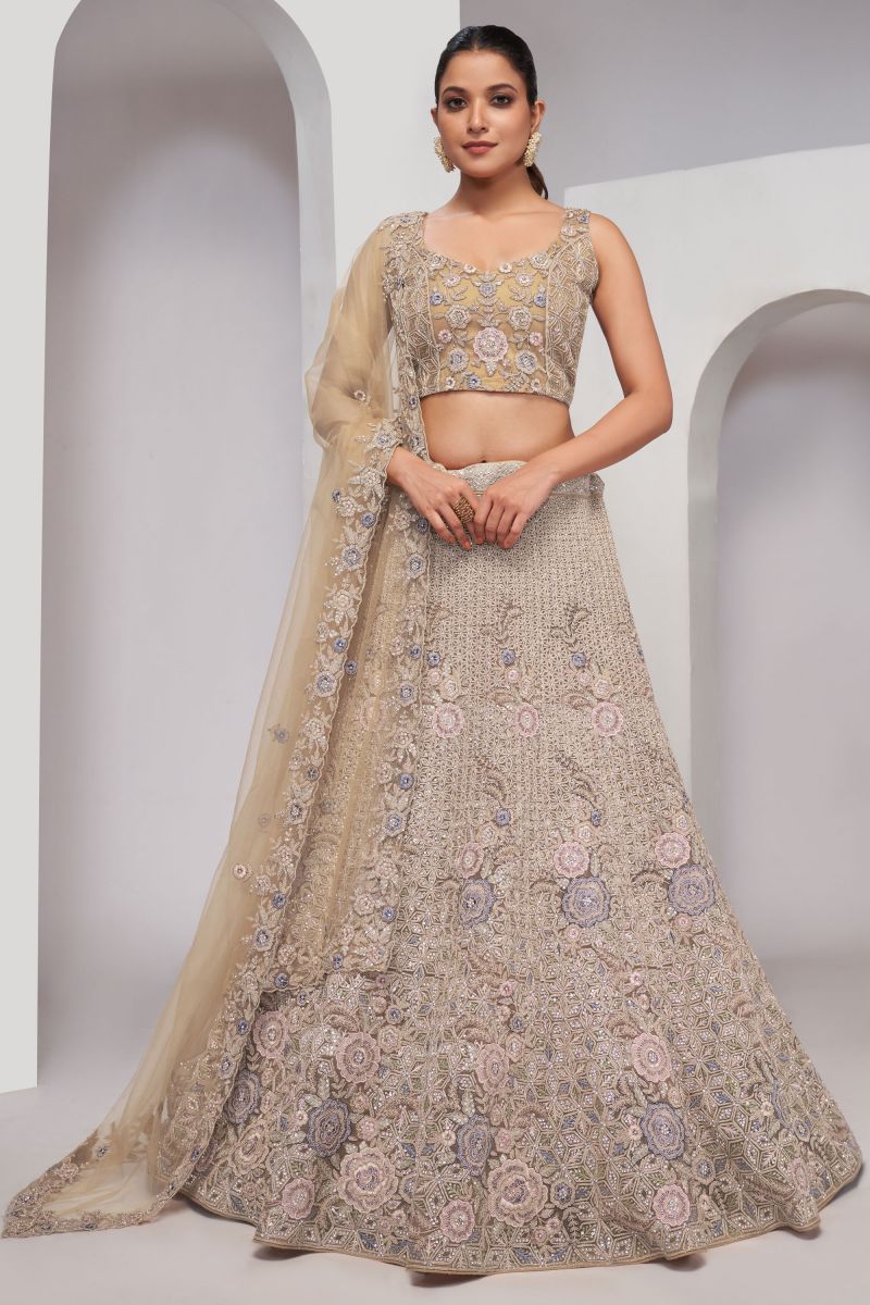 Tempting Net Fabric Beige Color Lehenga With Sequins Work