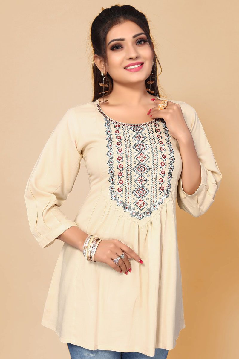 Tempting Rayon Fabric Off White Color Short Kurti With Embroidered Work