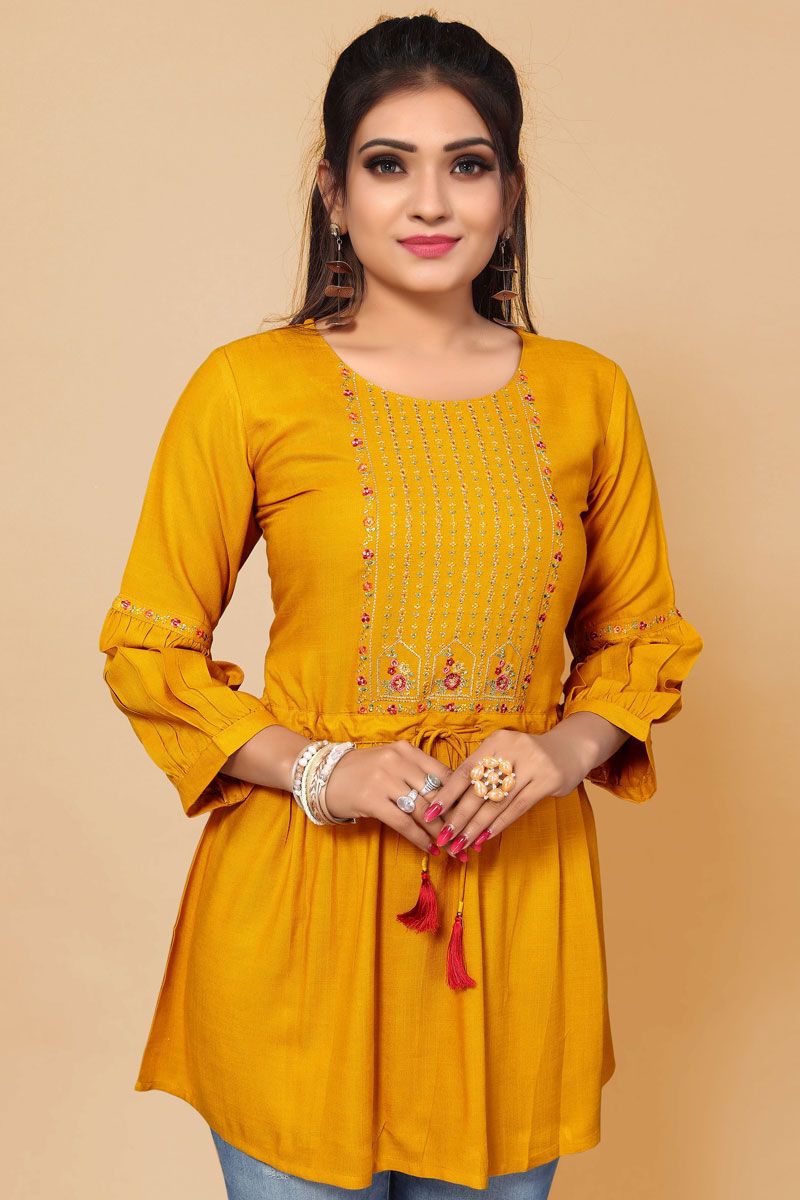 Engaging Mustard Color Rayon Fabric Short Kurti With Embroidered Work